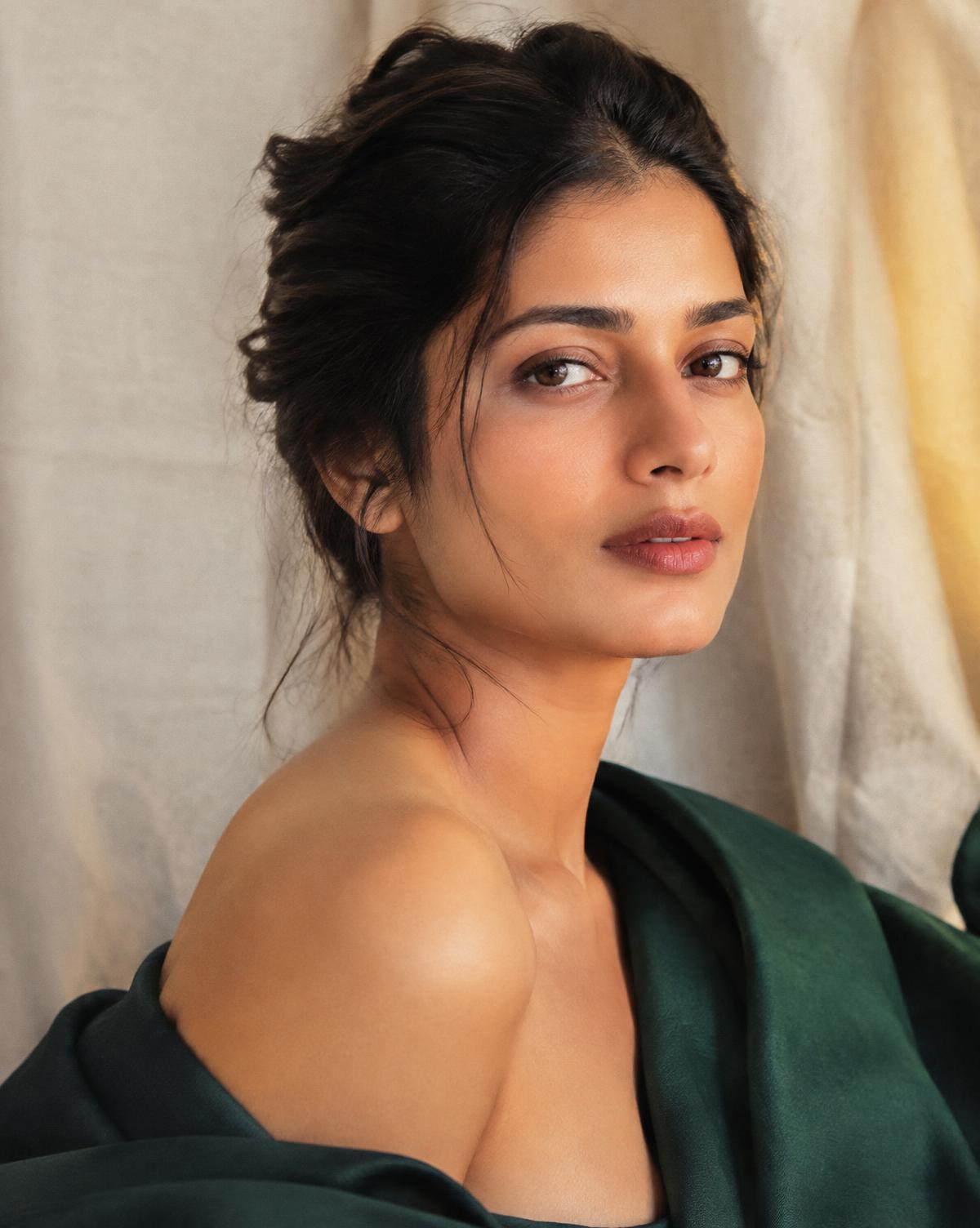 Woman with naturally radiant skin in soft window light